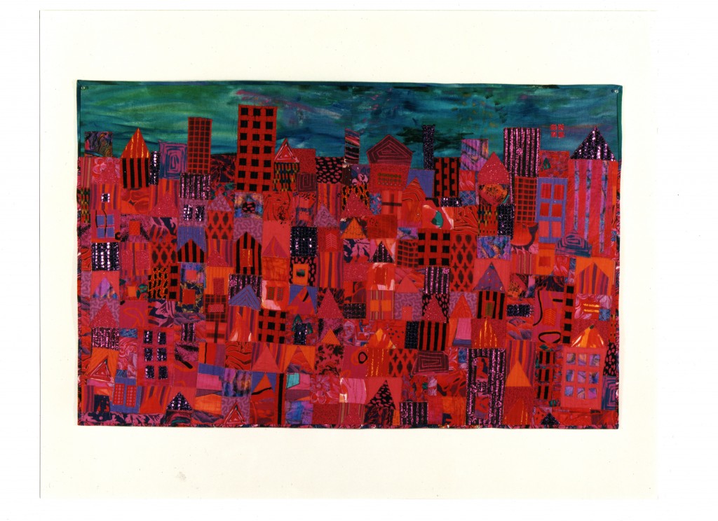 A textile art called the Red City with dark clouds