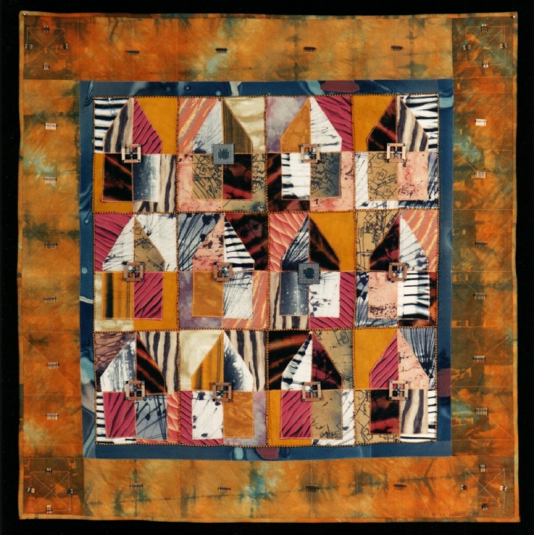 A textile art with orange as their primary color